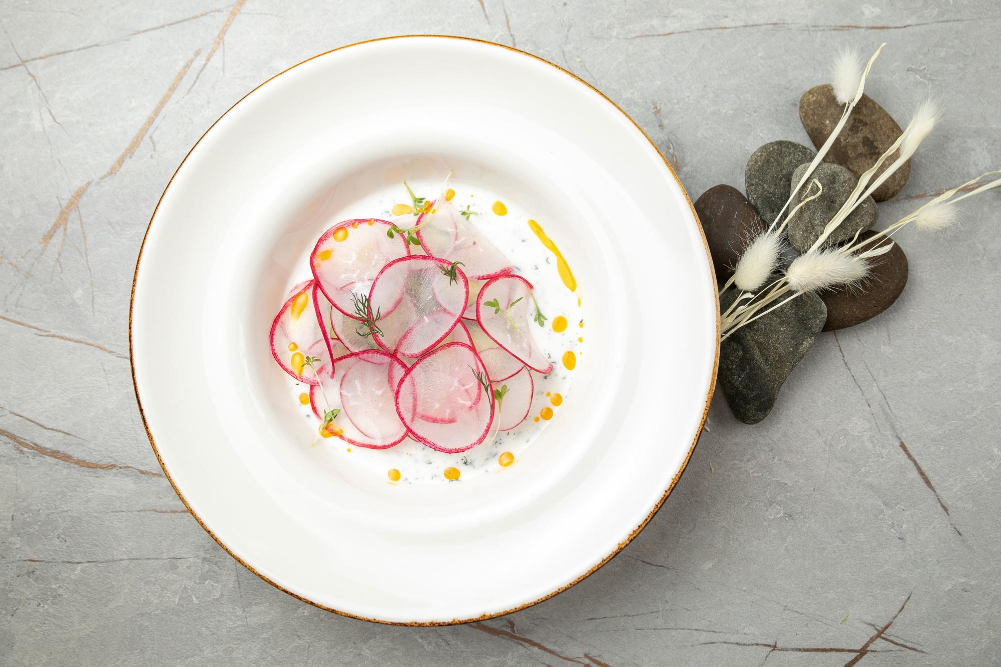Close-up plated tasting menu arrangement